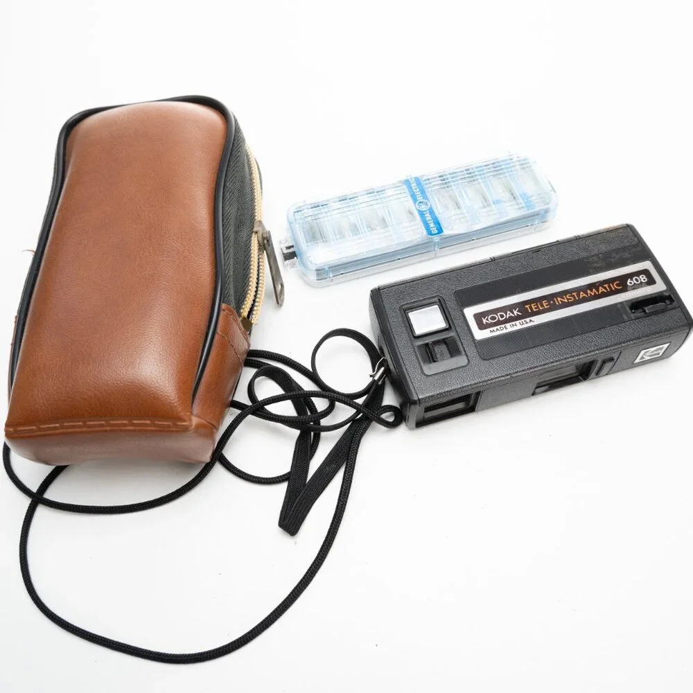 Vintage KODAK Tele Instamatic 608 110 camera w/ GE Flip Flash